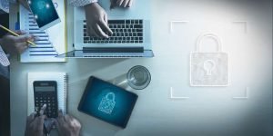 Office workspace showing secure technology and cybersecurity planning.